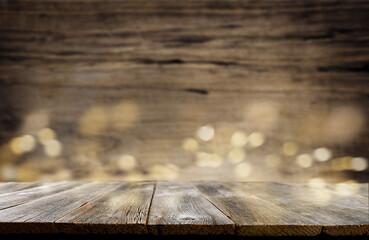 Empty rustic wooden table background. Old wood table with dark blurred background. Mock up.