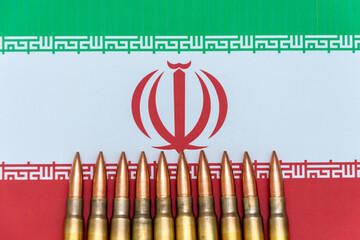 Ammunition against the background of Iran's national flag is the theme of defence and armaments.