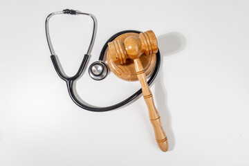 Legal Accountability in Healthcare – Gavel and Stethoscope On White Surface