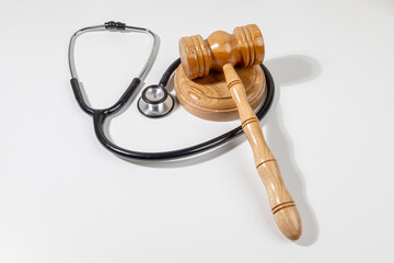 Legal Accountability in Healthcare – Gavel and Stethoscope On White Surface