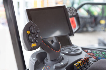 The cabin and control stick tractor of a modern tractor © DmyTo
