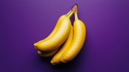 Bunch of bananas on purple background
