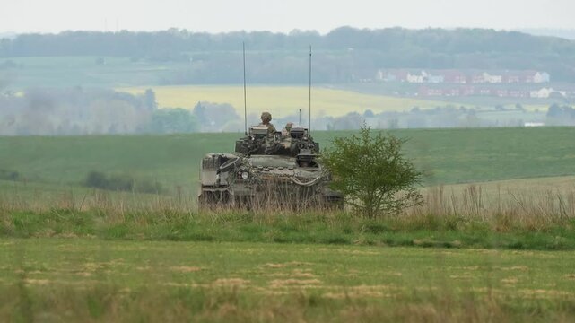 close-up of a British army Warrior FV510 IFV in mock battle action