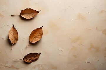 Dried autumn leaves scattered on a beige textured background, soft natural lighting, minimal composition, warm earthy tones, paper or linen texture, rustic and organic aesthetic, moody flat lay style.