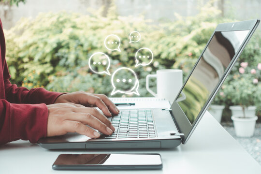 Online communication using AI live chat conversation Businessman chatting with AI assistant bot through live message on laptop for client service and information support in digital business technology