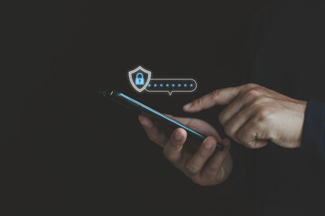 Hand using smartphone to input password on phone for technology security system and prevent hacker....