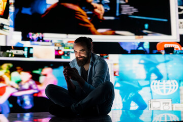 Young man in solitude is affected by anxiety and manipulation, highlighting suffering due to...