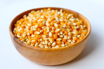 Yellow raw unpopped popcorn kernels
