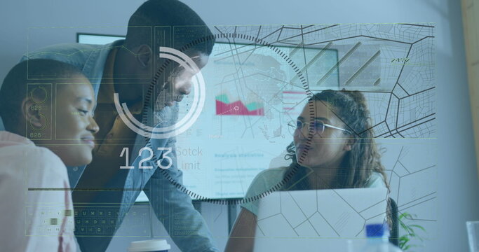 Analyzing data three coworkers leaning over office table, using laptop and floating charts and map