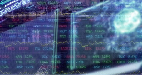 Displaying stock tickers and percentages with yellow line charts on glass inside finance office