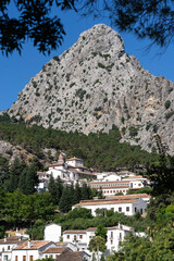 Panoramic view of the beautiful white village of Grazalema in a sunny day. Cadiz, Andalucia, Spain.