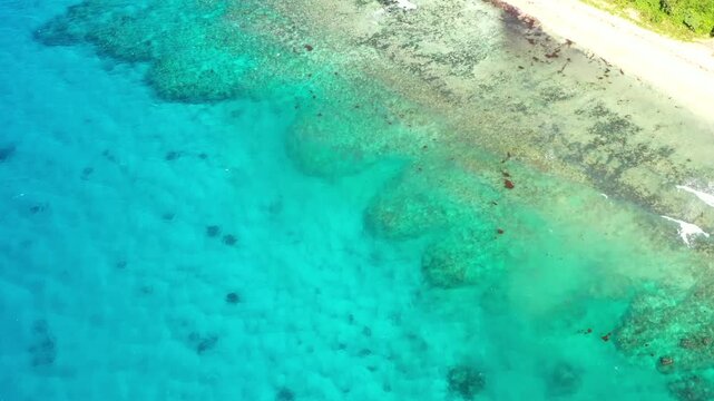 Hideaway beach coral reef on Tokoriki island in Fiji &ndash; aerial vertical panorama 4k.
