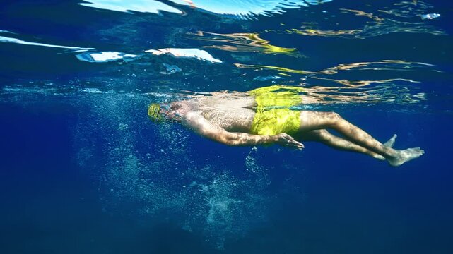 Athlete In The Ocean Swimming In Backstroke