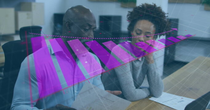 Two professionals reviewing reports, discussing data in meeting room, with purple 3D chart overlay