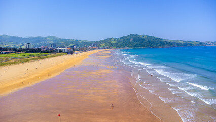 Zarautz beach and town on a sunny summer day in basque country, spain