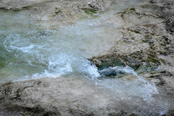 View of flowing water in a stream
