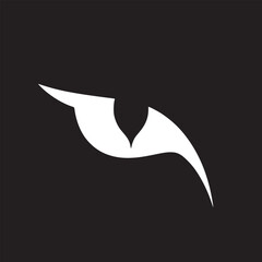 Abstract white eye shape on a black background creating a simple and modern artistic design style