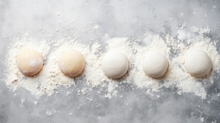 Progression of Dough Balls on Floury Surface for Culinary Artistry