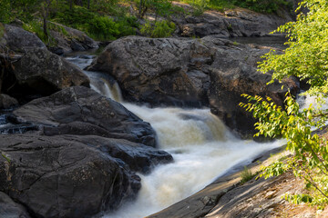 Victoria Falls on Black River Road in Washago, Ontario offers a tranquil escape with its cascading waters and lush surroundings.