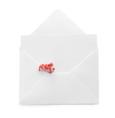 Blank invitation card and envelope with flower isolated on white, top view. Space for design