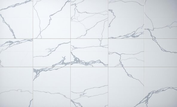 A luxurious seamless glitter pattern featuring a high-resolution top view of natural white grey marble tiles offers a touch of elegance and sophistication to any space both indoors and outdoors