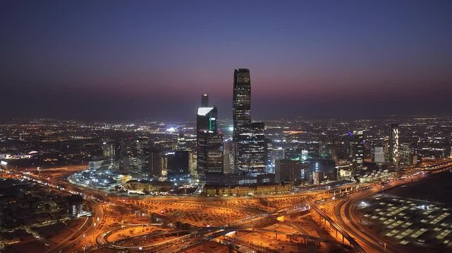 Aerial view of KAFD Towers after sunset at blue sky in Riyadh, Saudi Arabia