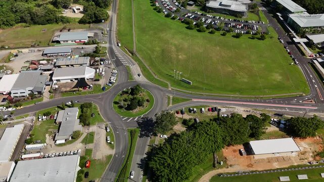 James Cook University Smithfield Campus, Cairns, Queensland, Australia: 4K Aerial Drone Footage of University Campus Surrounded by Tropical Rainforest, Green Hills, Urban Roads, and Natural Landscape