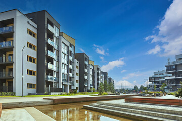 New modern block of flats in green area. residential apartment with flat buildings exterior. luxury...