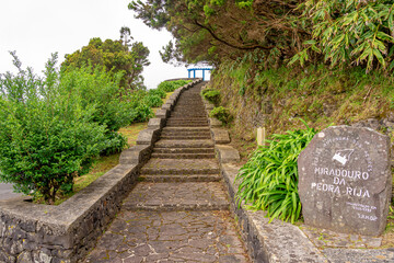 Access and monument at the Pedra Rija viewpoint overlooking Santa Barbara on the Azorean island of Santa Maria, Portugal.