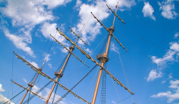 Clear sky, sailboat with mast retracted