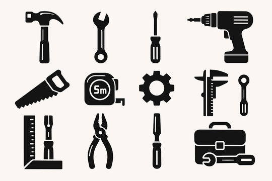 Collection of essential hand and power tools in black silhouettes