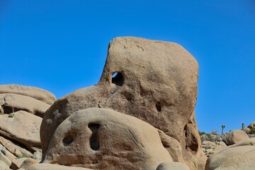 Interesting rock formations and stacks of boulders bake in the desert sun in California's Joshua Tree National Park