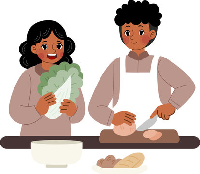 Kids Cooking Together: Two happy children, a girl and a boy, collaborate in the kitchen, preparing a healthy meal together.  The girl holds a head of cabbage.