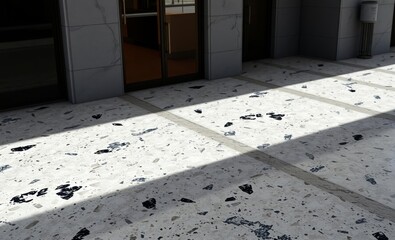 A cool seamless terrazzo pattern reminiscent of marble and concrete adorned this floor and facade exuding a trendy and natural aesthetic crafted by hand and featuring beautiful natural stones