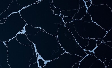 A seamless texture of deep black marble boasting high resolution ideal for backgrounds interior design elements or countertops showcasing its elegant veins and luxurious appearance in a detailed count