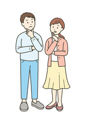 顔に手を当てて悩む成人男女夫婦