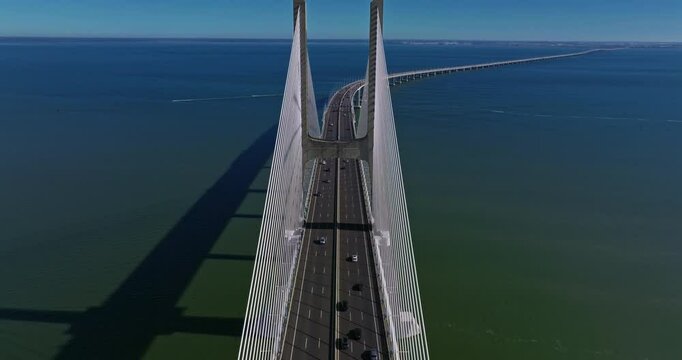 Aerial view of Vasco da Gama bridge crossing the Tagus river in Lisbon, Portugal. Modern design