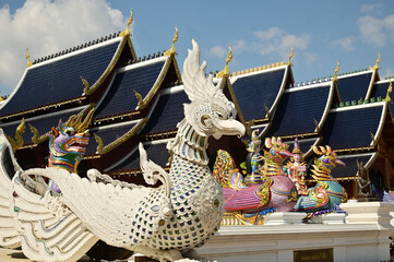 The statues of animals in Thai literature and angels are Thai art that decorate the front of the pagoda at Wat Den Sali Si Mueang Kaen temple. Located at Cheng Mai Province in Thailand.