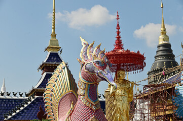 The statues of animals in Thai literature and monks are Thai art that decorate the front of the pagoda at Wat Den Sali Si Mueang Kaen temple. Located at Cheng Mai Province in Thailand.