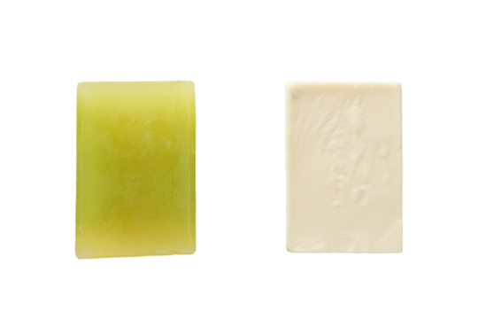 Two textured green and white soap bars, isolated on white, PNG