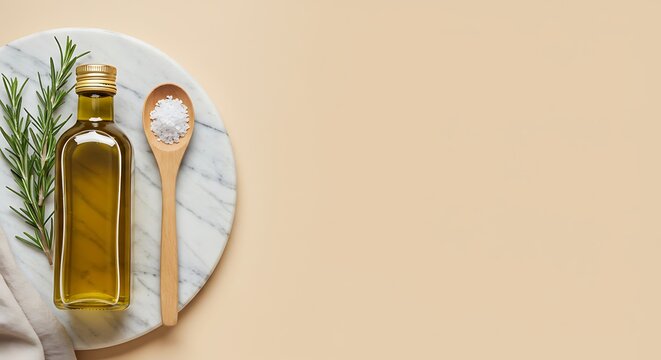 Olive oil, fresh rosemary, and sea salt on marble board background with copy space for Socil Media Designs