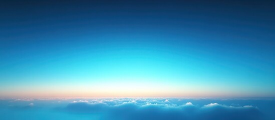 Obraz premium Vast serene sky at sunrise with soft clouds stretching to the horizon evoking calmness and peacefulness