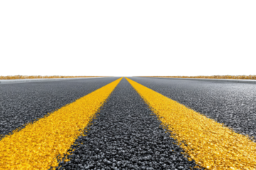 A low-angle, close-up view of a dark asphalt road stretching towards a black horizon, featuring two bright yellow center lines