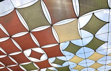 Colorful Shade Sails Creating a Dynamic Geometric Pattern