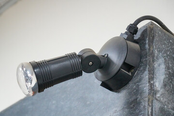 A spotlight is installed on an exhibition board.