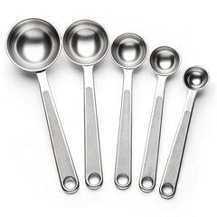 Set of stainless steel measuring spoons isolated on white background