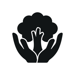 Solid glyph icon of tree in hands, ideal for climate, reforestation, and green care apps.