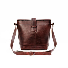Beautiful dark brown leather shoulder bag for women isolated on white background, perfect for...