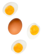 Top view set of raw brown chicken egg and cooked or boiled chicken eggs with egg yolk in three halves isolated with clipping path in png file format