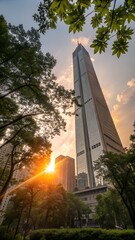 Sunset Skyline with Tower and Greenery